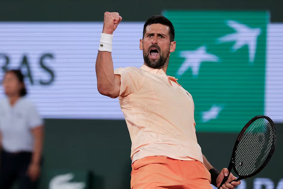 Djokovic fights back to keep French Open bid alive