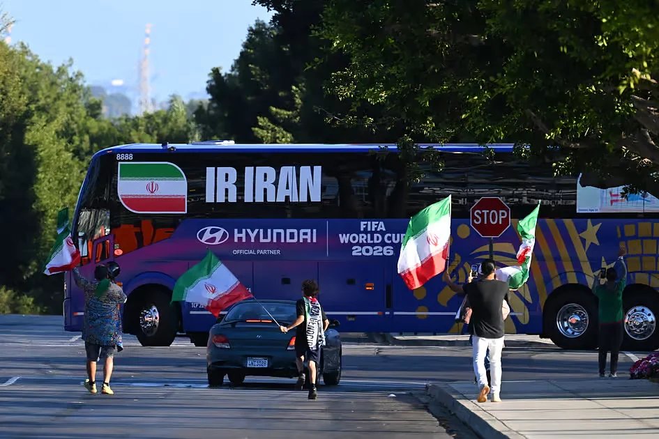Iran team arrives in US for World Cup opener as the two nations reach peace deal